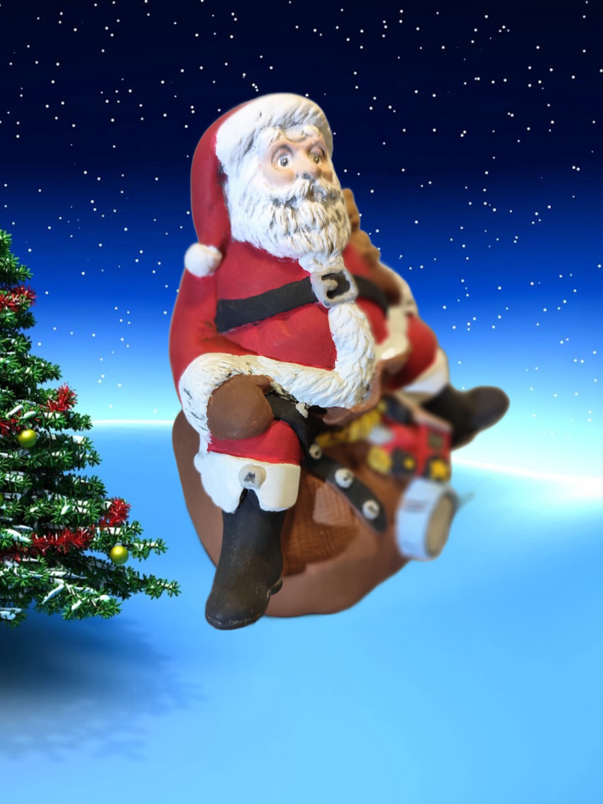 Kleiner Weihnachtsmann auf Sack sitzend – Bild 3